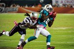 MIAMI - OCTOBER 4: Davone Bess #15 of the Miami Dolphins makes a catch against Jonathan Wilhite #24 of the New England Patriots at Sun Life Field on October 4, 2010 in Miami, Florida. (Photo by Scott Cunningham/Getty Images)