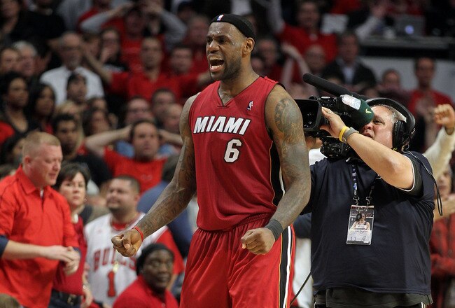 CHICAGO, IL - MAY 26:  LeBron James #6 of the Miami Heat celebrates after the Heat won 83-80 against the Chicago Bulls in Game Five of the Eastern Conference Finals during the 2011 NBA Playoffs on May 26, 2011 at the United Center in Chicago, Illinois. NOTE TO USER: User expressly acknowledges and agrees that, by downloading and or using this photograph, User is consenting to the terms and conditions of the Getty Images License Agreement.  (Photo by Mike Ehrmann/Getty Images)