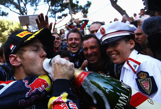 MONTE CARLO, MONACO - MAY 29:  Sebastian Vettel of Germany and Red Bull Racing celebrates with team mates after winning the Monaco Formula One Grand Prix at the Monte Carlo Circuit on May 29, 2011 in Monte Carlo, Monaco.  (Photo by Vladimir Rys/Getty Images)