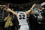 DENVER, CO - MARCH 19:  Jimmer Fredette #32 of the Brigham Young Cougars runs off of the court after defeating the Gonzaga Bulldogs during the third round of the 2011 NCAA men's basketball tournament at Pepsi Center on March 19, 2011 in Denver, Colorado.  (Photo by Doug Pensinger/Getty Images)
