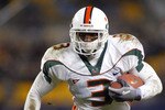 PITTSBURGH - NOVEMBER 29:  Jason Geathers #3 of the Miami Hurricanes heads upfield against the Pittsburgh Panthers  on November 29, 2003 at Heinz Field in Pittsburgh, Pennsylvania. Miami Won 28-14 and won the Big East and a bid to the Orange Bowl.  (Photo by Rick Stewart/Getty Images)