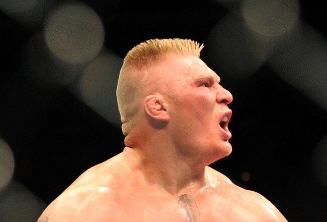 LAS VEGAS - JULY 11:  Brock Lesnar reacts after knocking out Frank Mir during their heavyweight title bout during UFC 100 on July 11, 2009 in Las Vegas, Nevada.  (Photo by Jon Kopaloff/Getty Images)