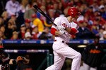 PHILADELPHIA - OCTOBER 16:  Chase Utley #26 of the Philadelphia Phillies hits an infield single in the sixth inning against the San Francisco Giants in Game One of the NLCS during the 2010 MLB Playoffs at Citizens Bank Park on October 16, 2010 in Philadelphia, Pennsylvania.  (Photo by Jeff Zelevansky/Getty Images)
