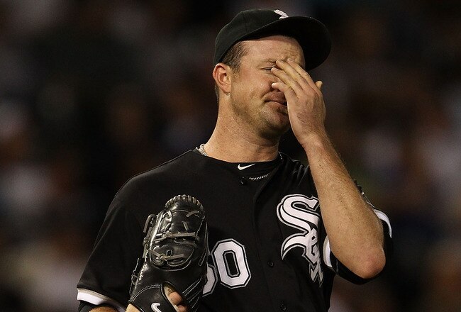 CHICAGO - SEPTEMBER 14: Starting pitcher John Danks #50 of the Chicago White Sox reacts after giving up a run to the Minnesota Twins at U.S. Cellular Field on September 14, 2010 in Chicago, Illinois. (Photo by Jonathan Daniel/Getty Images)