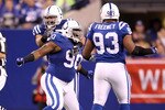 INDIANAPOLIS, IN - JANUARY 08:  Dan Muir #90 of the Indianapolis Colts celebrates with Dwight Freeney #93, and Fili Moala #95 after he sacked quarterback Mark Sanchez #6 of the New York Jets in the first quarter during their 2011 AFC wild card playoff game at Lucas Oil Stadium on January 8, 2011 in Indianapolis, Indiana.  (Photo by Andy Lyons/Getty Images)