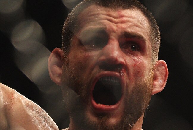 SYDNEY, AUSTRALIA - FEBRUARY 27:  Jon Fitch of the USA celebrates after his drawn fight against BJ Penn of the USA during their welterweight bout part of  UFC 127 at Acer Arena on February 27, 2011 in Sydney, Australia.  (Photo by Mark Kolbe/Getty Images)