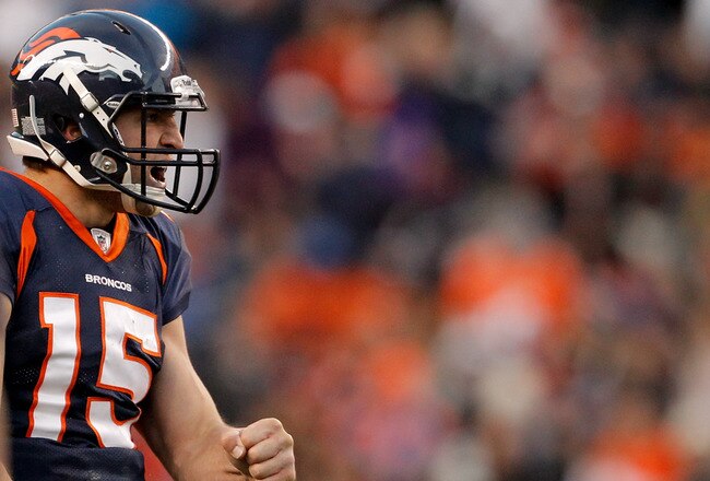 DENVER, CO - JANUARY 2:  Quarterback Tim Tebow #15 of the Denver Broncos celebrates a first down during the third quarter as running back Correll Buckhalter #28 walks back to the huddle against the San Diego Chargers at INVESCO Field at Mile High on January 2, 2011 in Denver, Colorado. (Photo by Justin Edmonds/Getty Images)