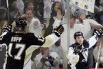 PITTSBURGH, PA - APRIL 15:  Craig Adams #27 (R) and Michael Rupp #17 of the Pittsburgh Penguins celebrate after Adams scored a second period goal against the Tampa Bay Lightning during Game Two of the Eastern Conference Quarterfinals during the 2011 NHL Stanley Cup Playoffs at Consol Energy Center on April 15, 2011 in Pittsburgh, Pennsylvania.  (Photo by Justin K. Aller/Getty Images)