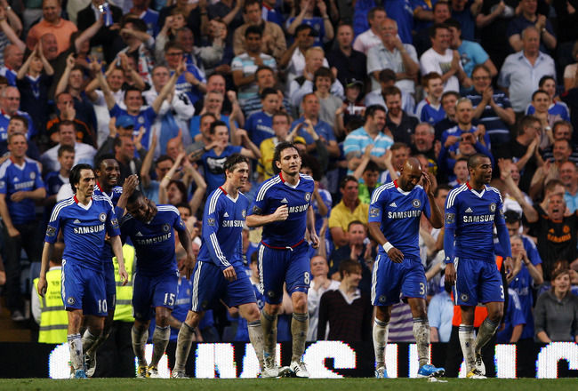 LONDON, ENGLAND - APRIL 23:  Florent Malouda (3rd L) of Chelsea celebrates with his team mates after scoring his team's third goal during the Barclays Premier League match between Chelsea and West Ham United at Stamford Bridge on April 23, 2011 in London, England.  (Photo by Dan Istitene/Getty Images)