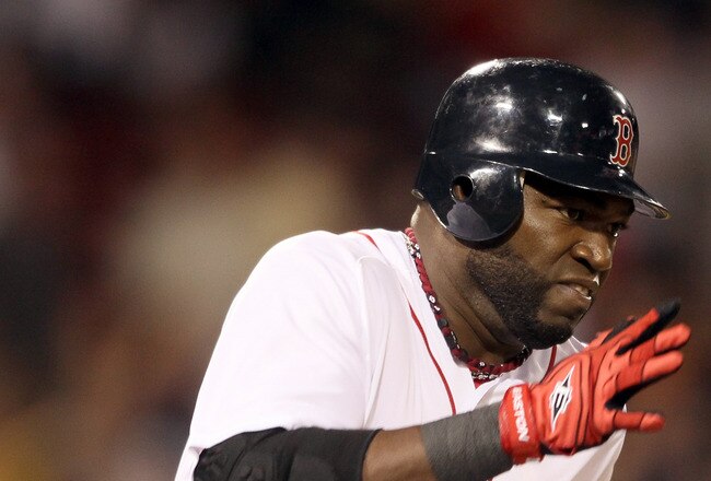 BOSTON, MA - MAY 31:  David Ortiz #34 of the Boston Red Sox heads around the bases after his three run homer in the eighth inning against the Chicago White Sox on May 31, 2011 at Fenway Park in Boston, Massachusetts.  (Photo by Elsa/Getty Images)