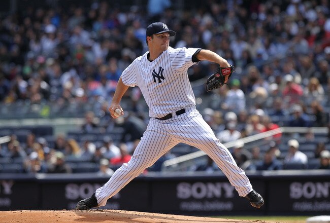 NEW YORK, NY - APRIL 03:  Phil Hughes #65 of the New York Yankees pitches against the Detroit Tigers at Yankee Stadium on April 3, 2011 in the Bronx borough of New York City.  (Photo by Nick Laham/Getty Images)