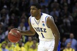 CHARLOTTE, NC - MARCH 20:  Kyrie Irving #1 of the Duke Blue Devils moves the ball while taking on the Michigan Wolverines during the third round of the 2011 NCAA men's basketball tournament at Time Warner Cable Arena on March 20, 2011 in Charlotte, North Carolina.  (Photo by Streeter Lecka/Getty Images)
