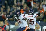 TORONTO, ON - NOVEMBER 07: Chris Harris #46 and Anthony Adams #95  of the Chicago Bears celebrate Harris's interception with 27 seconds left against the Buffalo Bills  at Rogers Centre on November 7, 2010 in Toronto, Canada. Chicago won 22-19. (Photo by Rick Stewart/Getty Images)