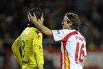 SEVILLE, SPAIN - DECEMBER 15:  Diego Capel of Sevilla (L) talks to Nuri Sahin at the end of the UEFA Europa League group J match between Sevilla and Borussia Dortmund at Estadio Ramon Sanchez Pizjuan on December 15, 2010 in Seville, Spain. The match ended 2-2.  (Photo by David Ramos/Getty Images)