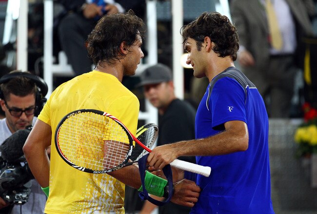 MADRID, SPAIN - MAY 07:  Roger Federer of Switzerland shakes hands with Rafael Nadal of Spain after Nadal won in 3 sets during day eight of the Mutua Madrilena Madrid Open Tennis on May 7, 2011 in Madrid, Spain.  (Photo by Julian Finney/Getty Images)