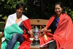 PARIS, FRANCE - JUNE 03:  Women's singles finalists Francesca Schiavone (L) of Italy and Na Li (R) of China pose ahead of saturday's final on day thirteen of the French Open at Roland Garros on June 3, 2011 in Paris, France.  (Photo by Matthew Stockman/Getty Images)