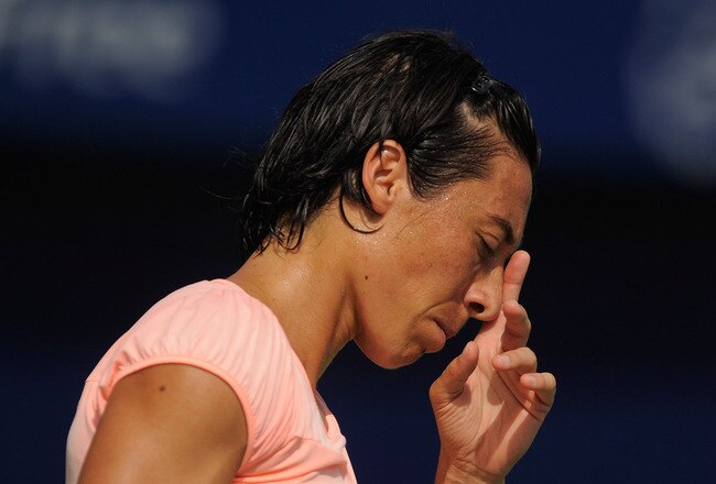 DUBAI, UNITED ARAB EMIRATES - FEBRUARY 17:  Francesca Schiavone of Italy looks dejected during her Round 3 match against Svetlana Kuznetsova of Russia during day four of the WTA Dubai Duty Free Tennis Championships at the Dubai Tennis Stadium on February 17, 2011 in Dubai, United Arab Emirates.  (Photo by Michael Regan/Getty Images)