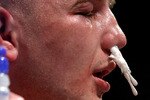 CARDIFF, WALES - MARCH 22:   Gavin Rees is attended to in his corner during the WBA light Welterweight fight against Andreas Kotelnik on March 22,  2008 at the Cardiff International Arena in Cardiff, Wales. (Photo by John Gichigi/Getty Images)