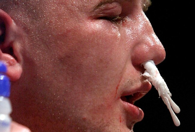 CARDIFF, WALES - MARCH 22:   Gavin Rees is attended to in his corner during the WBA light Welterweight fight against Andreas Kotelnik on March 22,  2008 at the Cardiff International Arena in Cardiff, Wales. (Photo by John Gichigi/Getty Images)