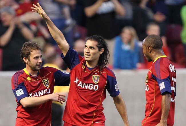SANDY, UT - JUNE 4: Fabian Espindola #7 of Real Salt Lake celebrates his goal with Ned Grabavoy #20 and Collen Warner #26 against the Vancouver Whitecaps during the second half of an MLS soccer game June 4, 2011 at Rio Tinto Stadium in Sandy, Utah. Real beat the Whitecaps 2-0. (Photo by George Frey/Getty Images)
