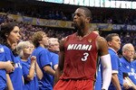 DALLAS, TX - JUNE 05:  Dwyane Wade #3 of the Miami Heat reacts against the Dallas Mavericks in Game Three of the 2011 NBA Finals at American Airlines Center on June 5, 2011 in Dallas, Texas.  NOTE TO USER: User expressly acknowledges and agrees that, by downloading and/or using this Photograph, user is consenting to the terms and conditions of the Getty Images License Agreement.  (Photo by Mike Ehrmann/Getty Images)