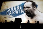 NEW YORK - MARCH 24:  UFC fighter Shane Carwin of Denver, Colorado appears on a giant screen at a press conference for UFC 111 at Radio City Music Hall on March 24, 2010 in New York City.  The fights will be held in Newark, New Jersey and fans will be able to attend a viewing party at Radio City Music Hall. (Photo by Jeff Zelevansky/Getty Images)