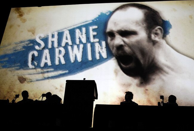 NEW YORK - MARCH 24:  UFC fighter Shane Carwin of Denver, Colorado appears on a giant screen at a press conference for UFC 111 at Radio City Music Hall on March 24, 2010 in New York City.  The fights will be held in Newark, New Jersey and fans will be able to attend a viewing party at Radio City Music Hall. (Photo by Jeff Zelevansky/Getty Images)