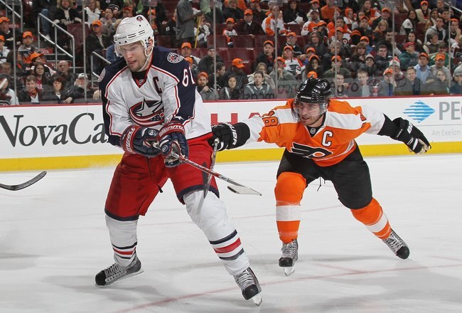 PHILADELPHIA - JANUARY 19: Rick Nash #61 of the Columbus Blue Jackets skates against Mike Richards #18 of the Philadelphia Flyers at the Wachovia Center on January 19, 2010 in Philadelphia, Pennsylvania.  (Photo by Bruce Bennett/Getty Images)