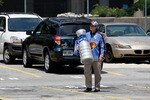 ATLANTA, GA - MAY 21:  Daniel 'Cup Guy' Green, an Atlanta Thrashers fan, walks to the rally to support keeping the team in Atlanta at Philips Arena on May 21, 2011 in Atlanta, Georgia.  It has been reported the Thrashers may relocate to Winnipeg, Canada.  (Photo by Kevin C. Cox/Getty Images)