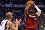 DALLAS, TX - JUNE 05:  Dwyane Wade #3 of the Miami Heat shoots over Jason Kidd #2 of the Dallas Mavericks in Game Three of the 2011 NBA Finals at American Airlines Center on June 5, 2011 in Dallas, Texas.  NOTE TO USER: User expressly acknowledges and agrees that, by downloading and/or using this Photograph, user is consenting to the terms and conditions of the Getty Images License Agreement.  (Photo by Ronald Martinez/Getty Images)