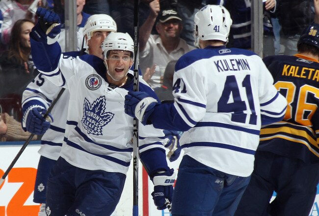 TORONTO, ON - NOVEMBER 06: Clarke MacArthur #16 of the Toronto Maple Leafs celebrtaes a goal by Nikolai Kulemin #41 against the Buffalo Sabres at the Air Canada Centre on November 6, 2010 in Toronto, Canada. The Sabres defeated the Maple Leafs 3-2.  (Photo by Bruce Bennett/Getty Images)