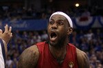 DALLAS, TX - JUNE 05:  LeBron James #6 of the Miami Heat reacts with the ball alongside Shawn Marion #0 of the Dallas Mavericks in the second half in Game Three of the 2011 NBA Finals at American Airlines Center on June 5, 2011 in Dallas, Texas.  NOTE TO USER: User expressly acknowledges and agrees that, by downloading and/or using this Photograph, user is consenting to the terms and conditions of the Getty Images License Agreement.  (Photo by Ronald Martinez/Getty Images)