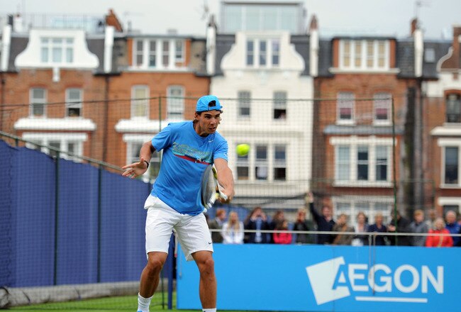 LONDON, ENGLAND - JUNE 06:  Rafael Nadal of Spain  eyes the ball on the practice court during day one of the AEGON Championships at Queens Club on June 6, 2011 in London, England.  (Photo by Michael Regan/Getty Images)