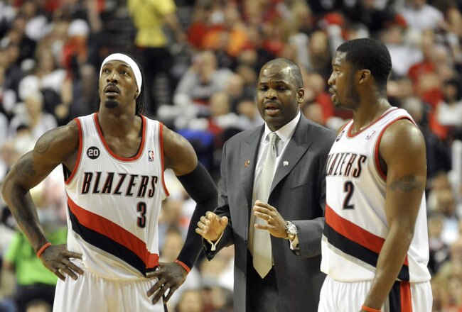 PORTLAND, OR - APRIL 28: (L to R) Gerald Wallace #3, head coach Nate McMillan and Wes Matthews #2 of the Portland Trail Blazers gather during a time out in the fourth quarter of Game Six of the Western Conference Quartefinals in the 2011 NBA Playsoffs on April 28, 2011 at the Rose garden in Portland, Oregon. The Mavericks won the game 103-96 to win the series and advance. NOTE TO USER: User expressly acknowledges and agrees that, by downloading and or using this photograph, User is consenting to the terms and conditions of the Getty Images License Agreement. (Photo by Steve Dykes/Getty Images)