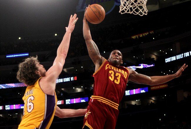 LOS ANGELES, CA - JANUARY 11:  Alonzo Gee #33 of the Cleveland Cavaliers dunks over Pau Gasol #16 of the Los Angeles Lakers at Staples Center on January 11, 2011 in Los Angeles, California.  The Lakers won 112-57.  NOTE TO USER: User expressly acknowledges and agrees that, by downloading and or using this photograph, User is consenting to the terms and conditions of the Getty Images License Agreement.  (Photo by Stephen Dunn/Getty Images)