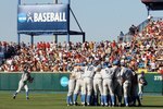 OMAHA, NE - JUNE 29:  The UCLA Bruins warm up before game 2 of the men's 2010 NCAA College Baseball World Series against the South Carolina Gamecocks at Rosenblatt Stadium on June 29, 2010 in Omaha, Nebraska. The Gamecocks defeated the Bruins 2-1 in eleven innings to win the National Championship.  (Photo by Christian Petersen/Getty Images)