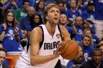 DALLAS, TX - JUNE 05:  Dirk Nowitzki #41 of the Dallas Mavericks shoots a three-pointer while taking on the Miami Heat in Game Three of the 2011 NBA Finals at American Airlines Center on June 5, 2011 in Dallas, Texas.  NOTE TO USER: User expressly acknowledges and agrees that, by downloading and/or using this Photograph, user is consenting to the terms and conditions of the Getty Images License Agreement.  (Photo by Ronald Martinez/Getty Images)