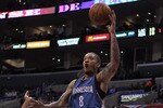 LOS ANGELES, CA - DECEMBER 20:  Michael Beasley #8 of the Minnesota Timberwolves drives to the basket past Ryan Gomes #15 of the Los Angeles Clippers during the first half at Staples Center on December 20, 2010 in Los Angeles, California. NOTE TO USER: User expressly acknowledges and agrees that, by downloading and or using this photograph, User is consenting to the terms and conditions of the Getty Images License Agreement.  (Photo by Jeff Gross/Getty Images)