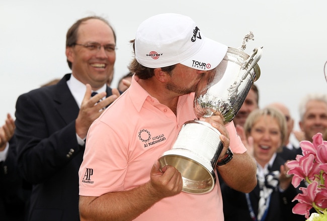 PEBBLE BEACH, CA - JUNE 20:  Graeme McDowell (R) of Northern Ireland celebrates with the trophy on the 18th green after winning the 110th U.S. Open at Pebble Beach Golf Links on June 20, 2010 in Pebble Beach, California.  (Photo by Ross Kinnaird/Getty Images)