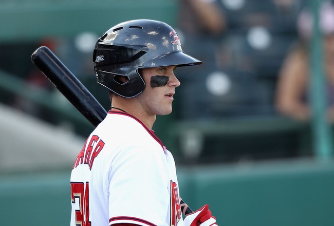 SCOTTSDALE, AZ - OCTOBER 23: Washington Nationals prospect Bryce Harper #34 playing for the Scottsdale Scorpions warms up on deck during the AZ Fall League game against the Phoenix Desert Dogs at Scottsdale Stadium on October 23, 2010 in Scottsdale, Arizona. (Photo by Christian Petersen/Getty Images)