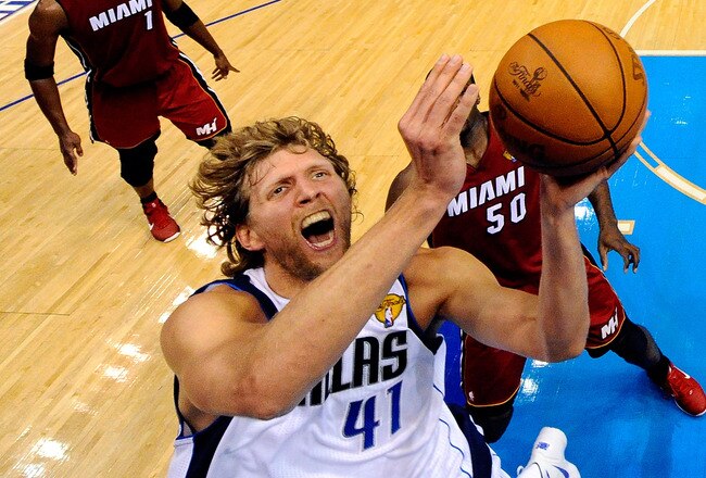 DALLAS, TX - JUNE 07:  Dirk Nowitzki #41 of the Dallas Mavericks attempts a shot against the Miami Heat in Game Four of the 2011 NBA Finals at American Airlines Center on June 7, 2011 in Dallas, Texas. NOTE TO USER: User expressly acknowledges and agrees that, by downloading and/or using this Photograph, user is consenting to the terms and conditions of the Getty Images License Agreement  (Photo by Larry W. Smith-Pool/Getty Images)