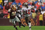 LANDOVER, MD - DECEMBER 12:  Arrelious Benn #17 of the Tampa Bay Buccaneers runs the ball against the Washington Redskins at FedExField on December 12, 2010 in Landover, Maryland. The Buccaneers defeated the Redskins 17-16. (Photo by Larry French/Getty Images)