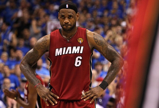 DALLAS, TX - JUNE 07:  LeBron James #6 of the Miami Heat looks on against the Dallas Mavericks in Game Four of the 2011 NBA Finals at American Airlines Center on June 7, 2011 in Dallas, Texas. NOTE TO USER: User expressly acknowledges and agrees that, by downloading and/or using this Photograph, user is consenting to the terms and conditions of the Getty Images License Agreement  (Photo by Ronald Martinez/Getty Images)