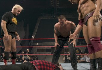 Randy-orton-having-sharp-eye-on-mick-foley_crop_340x234