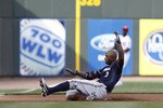 CINCINNATI, OH - JUNE 1: Nyjer Morgan #2 of the Milwaukee Brewers slides into third base with a triple in the first inning against the Cincinnati Reds at Great American Ball Park on June 1, 2011 in Cincinnati, Ohio. (Photo by Joe Robbins/Getty Images)
