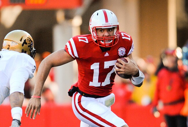 LINCOLN, NE - NOVEMBER 26: Cody Green #17 of the Nebraska Cornhuskers slips past Jimmy Smith #3 of the Colorado Buffaloes during their game at Memorial Stadium on November 26, 2010 in Lincoln, Nebraska. Nebraska defeated Colorado 45-17 (Photo by Eric Francis/Getty Images)
