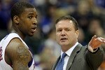 KANSAS CITY, MO - MARCH 10:  Head coach Bill Self of the Kansas Jayhawks speaks with Thomas Robinson #0 during their quarterfinal game against the Oklahoma State Cowboys in the 2011 Phillips 66 Big 12 Men's Basketball Tournament at Sprint Center on March 10, 2011 in Kansas City, Missouri.  (Photo by Jamie Squire/Getty Images)