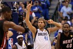 DALLAS, TX - JUNE 09:  Dirk Nowitzki #41 of the Dallas Mavericks gestures on court against the Miami Heat in Game Five of the 2011 NBA Finals at American Airlines Center on June 9, 2011 in Dallas, Texas.  NOTE TO USER: User expressly acknowledges and agrees that, by downloading and/or using this Photograph, user is consenting to the terms and conditions of the Getty Images License Agreement.  (Photo by Ronald Martinez/Getty Images)