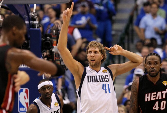 DALLAS, TX - JUNE 09:  Dirk Nowitzki #41 of the Dallas Mavericks gestures on court against the Miami Heat in Game Five of the 2011 NBA Finals at American Airlines Center on June 9, 2011 in Dallas, Texas.  NOTE TO USER: User expressly acknowledges and agrees that, by downloading and/or using this Photograph, user is consenting to the terms and conditions of the Getty Images License Agreement.  (Photo by Ronald Martinez/Getty Images)