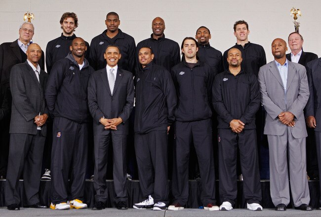 WASHINGTON, DC - DECEMBER 13:  (AFP OUT) U.S. President Barack Obama (Bottom row 4L)) poses for photographs with members of the 2010 NBA Championship Los Angeles Lakers during an event at the Boys and Girls Club at THEARC   December 13, 2010 in Washington, DC. The Lakers team volunteered on projects at the club before being honored by the president for their victory.  (Photo by Chip Somodevilla/Getty Images)